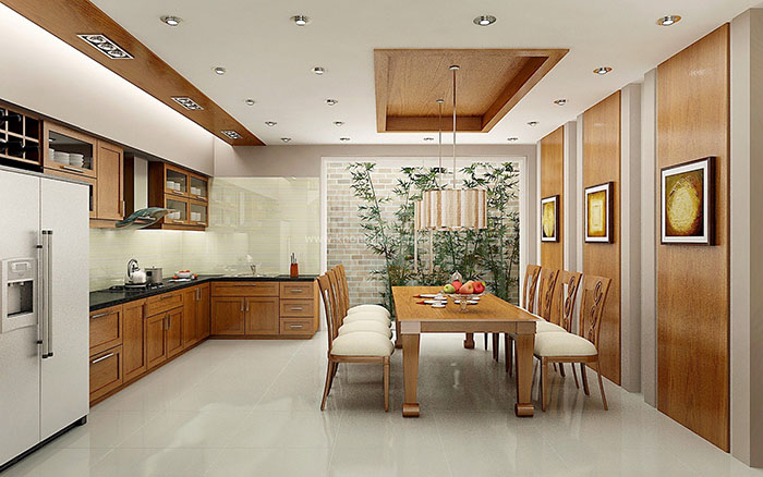 Phòng bếp sử dụng tông màu trầm của gỗ mang lại cảm giác ấm cúng và gần gũi